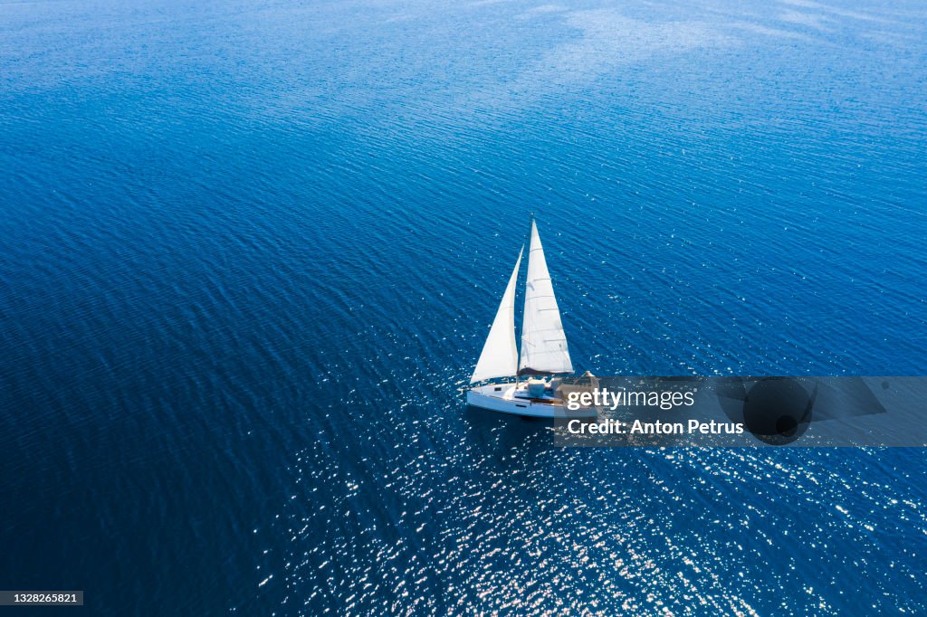 Yacht with white sails at sea. Luxury vacation at sea, yachting in Croatia.