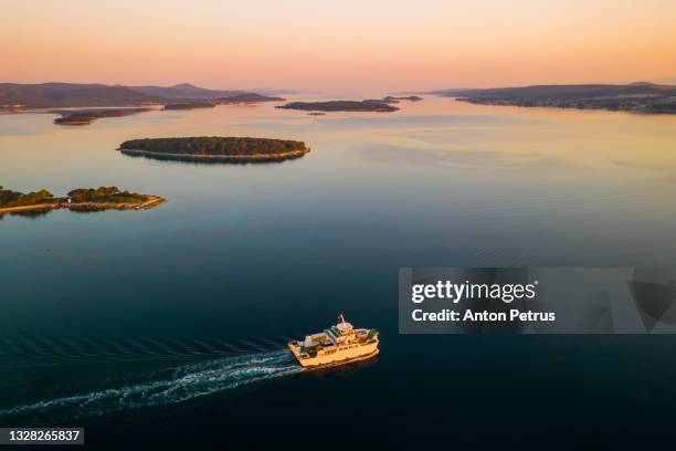 aerial view of the ferry at sunset. adriatic sea, croatia - ferry stock-fotos und bilder