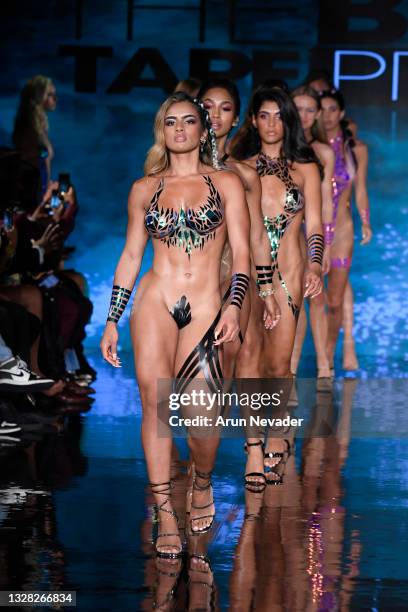 Models walk the runway at the BLACK TAPE PROJECT Show during Miami Swim Week Powered By Art Hearts Fashion at Faena Forum on July 11, 2021 in Miami...