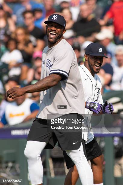 World Series Champion and six time MLB All-Star CC Sabathia with Actor Anthony Mackie during the MLB All-Star Celebrity Softball Game at Coors Field...