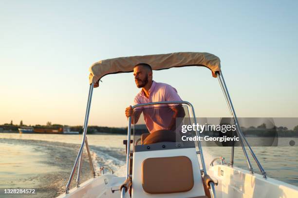 boat life - motor boat stock pictures, royalty-free photos & images