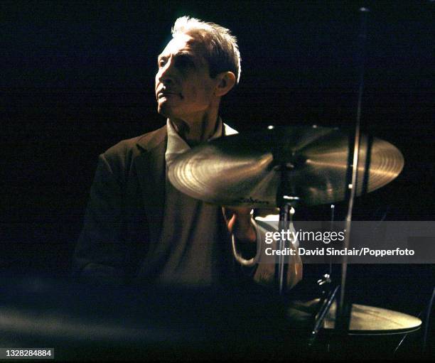 English drummer Charlie Watts of the Rolling Stones, performs live on stage at Ronnie Scott's Jazz Club in Soho, London on 4th June 2001.