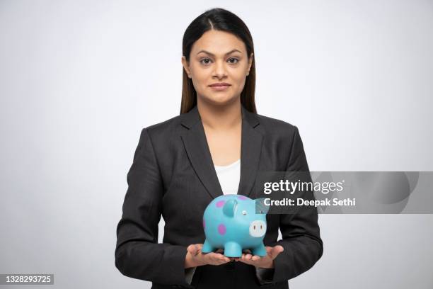 portrait of a young business women standing isolated over white background - indian corporate women background stockfoto's en -beelden