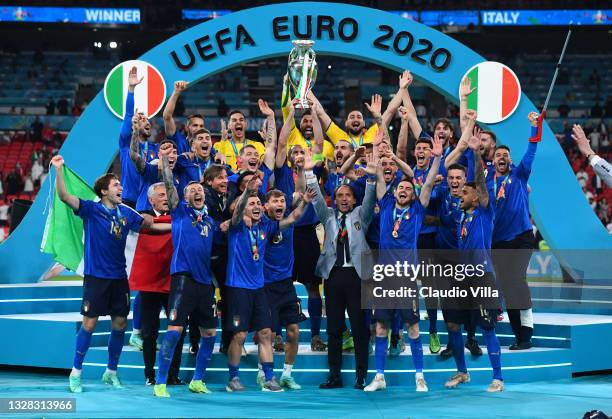 Giorgio Chiellini, Captain of Italy lifts The Henri Delaunay Trophy following his team's victory in the UEFA Euro 2020 Championship Final between...