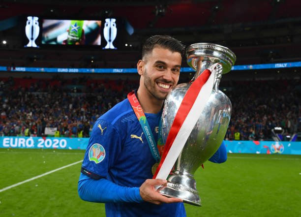 Leonardo Spinazzola kisses The Henri Delaunay Trophy following his team's victory in the UEFA Euro 2020 Championship Final between Italy and England...