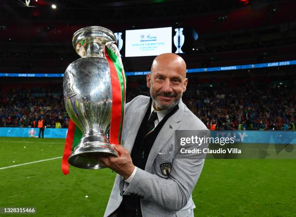 Head of Italy delegation Gianluca Vialli celebrates with The Henri Delaunay Trophy following his team's victory in the UEFA Euro 2020 Championship...