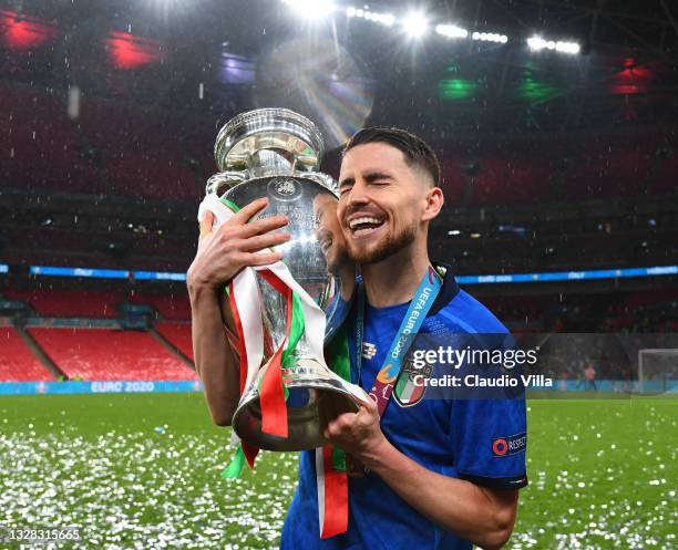 Jorginho of Italy celebrates with The Henri Delaunay Trophy following his team's victory in the UEFA Euro 2020 Championship Final between Italy and...