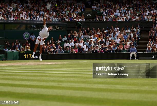 Novak Djokovic of Serbia serves during his men's Singles Final match against Matteo Berrettini of Italy on Day Thirteen of The Championships -...