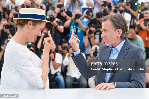 Vicky Krieps and Tim Roth attend the "Bergman Island" photocall during the 74th annual Cannes Film Festival on July 12, 2021 in Cannes, France.
