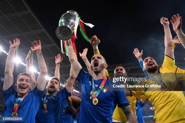 Leonardo Bonucci of Italy celebrates with the European Championship Trophy whilst celebrating with the fans during the UEFA Euro 2020 Championship...