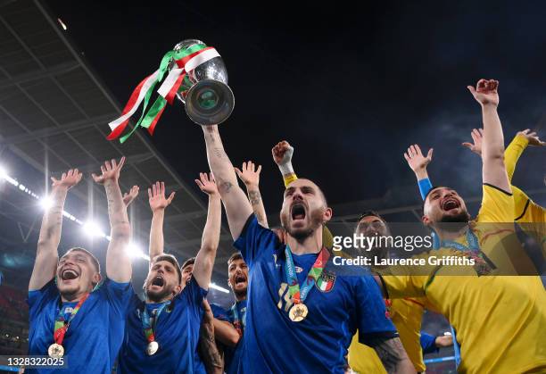 Leonardo Bonucci of Italy celebrates with the European Championship Trophy whilst celebrating with the fans during the UEFA Euro 2020 Championship...