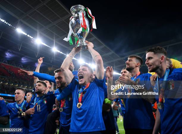 Andrea Belotti of Italy of Italy celebrates with the European Championship Trophy whilst celebrating with the fans during the UEFA Euro 2020...