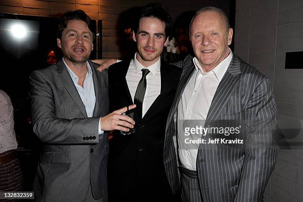 Mikael Hafstrom, Colin O'Donoghue and Anthony Hopkins celebrates at the after party for "The Rite" at My House on January 26, 2011 in Hollywood,...