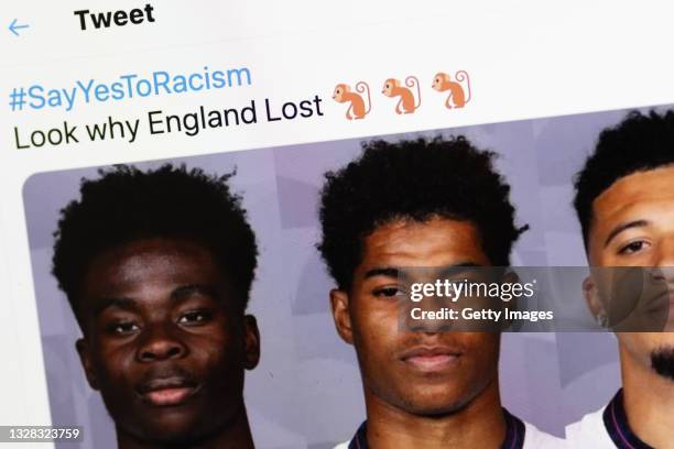 Tweet featuring racist content directed at the England football team is seen on July 12, 2021 in London, England. England manager Gareth Southgate,...