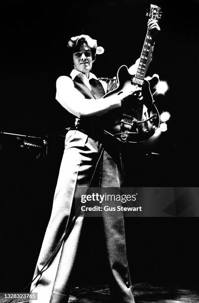 Bill Nelson of Be-Bop Deluxe performs on stage at Hammersmith Odeon, London, England, on February 26th, 1977.