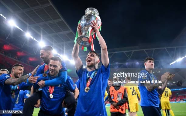 Jorginho of Italy celebrates with the European Championship Trophy whilst celebrating with the fans during the UEFA Euro 2020 Championship Final...