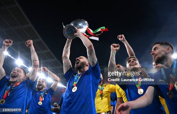 Leonardo Bonucci of Italy celebrates with the European Championship Trophy after victory in the UEFA Euro 2020 Championship Final between Italy and...