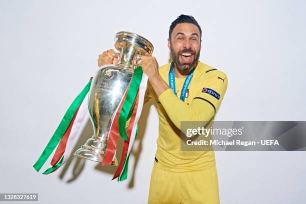 Salvatore Sirigu of Italy poses with The Henri Delaunay Trophy during an Italy Portrait Session following their side's victory in the UEFA Euro 2020...