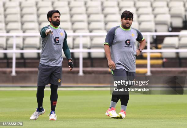 Pakistan T20 players Mohammad Hafeez and Azam Khan look on during nets ahead of the 3rd ODI between England and Pakistan at Edgbaston on July 12,...