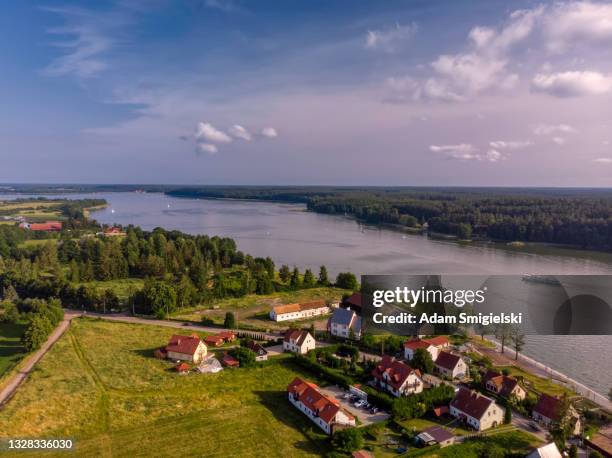 panoramic view of small lakeside village mikolajki in masuria - mikolajki bildbanksfoton och bilder