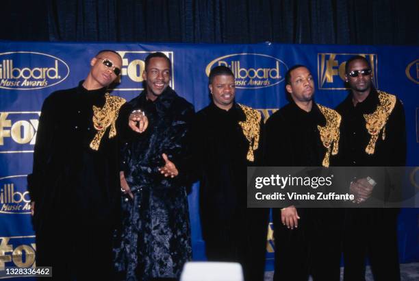 American R&B group New Edition at the Billboard Music Awards in Las Vegas, USA, 4th December 1996. From left to right, they are singers Ronnie DeVoe,...