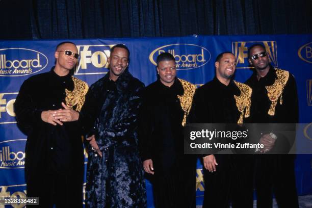 American R&B group New Edition at the Billboard Music Awards in Las Vegas, USA, 4th December 1996. From left to right, they are singers Ronnie DeVoe,...