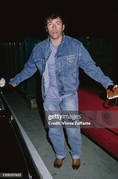 American singer and musician Bruce Springsteen wearing double denim, USA, circa 1990.