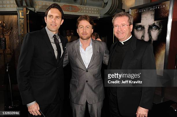 Author Matt Baglio, director Mikael Hafstrom and Father Gary Thomas arrive at the Los Angeles Premiere of "The Rite" held at Grauman's Chinese...