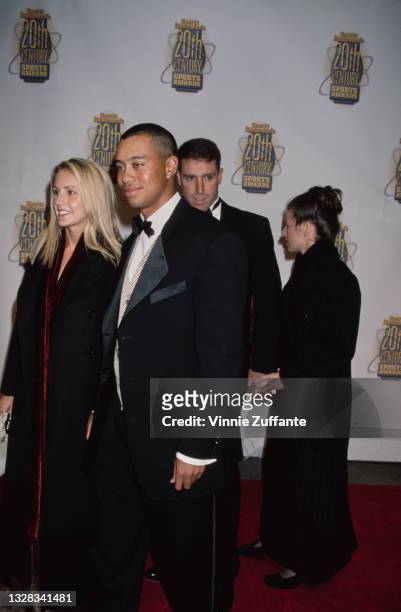 American golfer Tiger Woods and his girlfriend Joanna Jagoda attend the Sports Illustrated 20th Century Sports Awards in New York City, USA, 2nd...