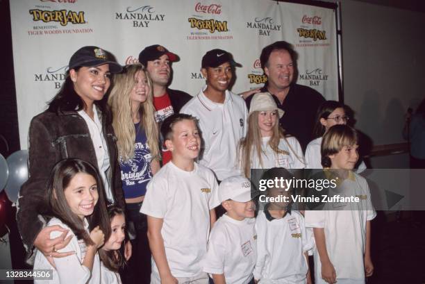 From left to right , actresses Lara Dutta and Tara Reid, television host Carson Daly, golfer Tiger Woods and actor Dennis Haskins attend the Tiger...