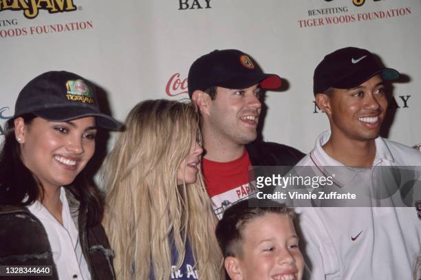 From left to right, actresses Lara Dutta and Tara Reid, television host Carson Daly and golfer Tiger Woods attend the Tiger Jam III benefit in aid of...