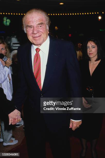 American actor Lionel Stander attends the premiere of 'Chances Are' at the Mann's Bruin Theatre in Los Angeles, USA, 8th March 1989.