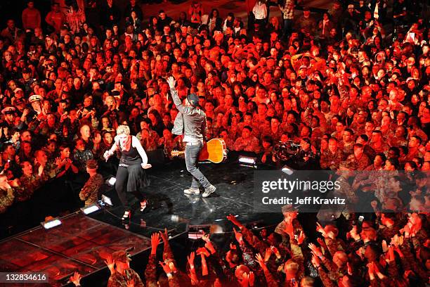 Music group Sugarland performs onstage during "VH1 Divas Salute the Troops" presented by the USO at the MCAS Miramar on December 3, 2010 in Miramar,...