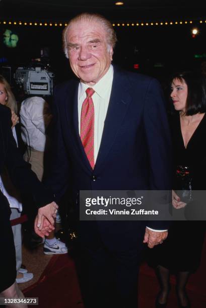 American actor Lionel Stander attends the premiere of 'Chances Are' at the Mann's Bruin Theatre in Los Angeles, USA, 8th March 1989.