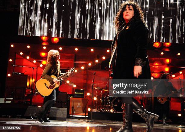 Musicians Nancy Wilson and Ann Wilson of Heart perform onstage during "VH1 Divas Salute the Troops" presented by the USO at the MCAS Miramar on...