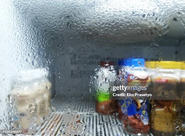 soft drink bottle in the refrigerator - refrigerated section supermarket stock pictures, royalty-free photos & images