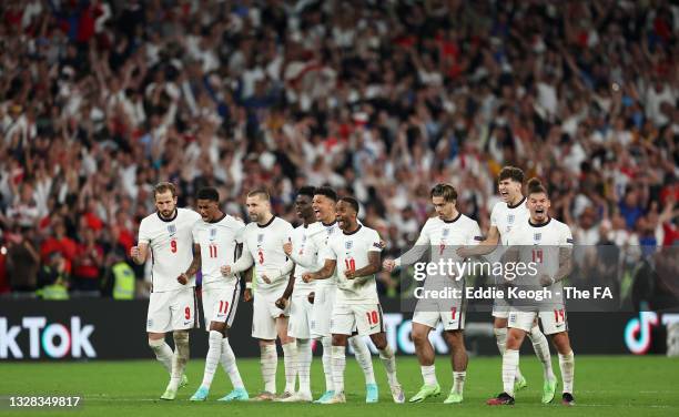 Players of England celebrate their side's second penalty in the penalty shoot out scored by Harry Maguire of England during the UEFA Euro 2020...