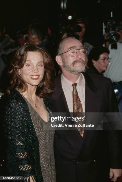 American actress Leigh Taylor-Young and English singer-songwriter and guitarist Dave Mason at the premiere of 'Get Shorty' at the Mann's Chinese...