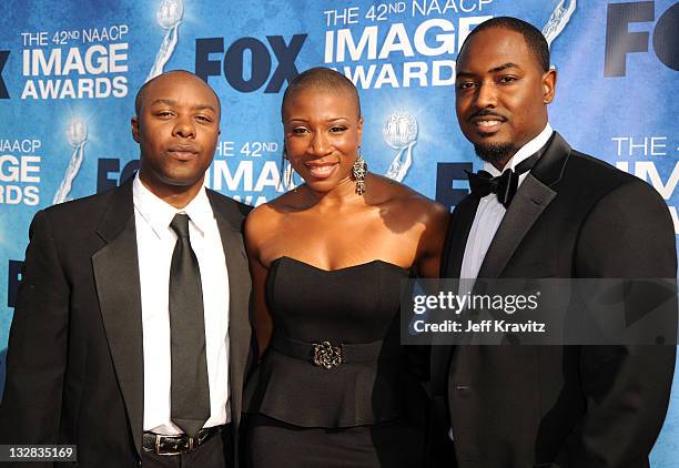 Writer Phononzell Williams, actress Aisha Hinds and writer Mike Flynn arrive at the 42nd Annual NAACP Image Awards held at The Shrine Auditorium on...