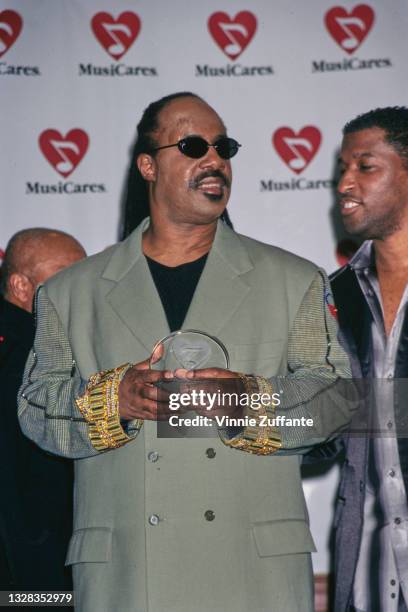 American singer, songwriter and musician Stevie Wonder is named MusiCares Person of the Year in Century City, Los Angeles, USA, 22nd February 1999.