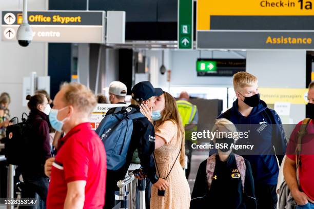 Holidaymakers traveling by airline queue at at Schiphol International Airport on July 12, 2021 in Amsterdam, Netherlands. Positive COVID-19 tests are...