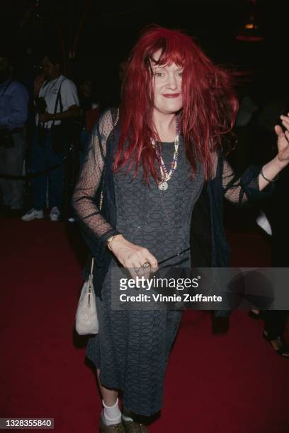American singer, artist and poet Exene Cervenka, lead singer of punk rock band X, attends the premiere of 'Escape from L.A.' at Mann's Chinese...