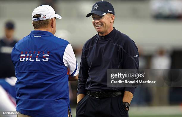 Head coach Jason Garrett of the Dallas Cowboys talks with head coach, Chan Gailey of the Buffalo Bills at Cowboys Stadium on November 13, 2011 in...