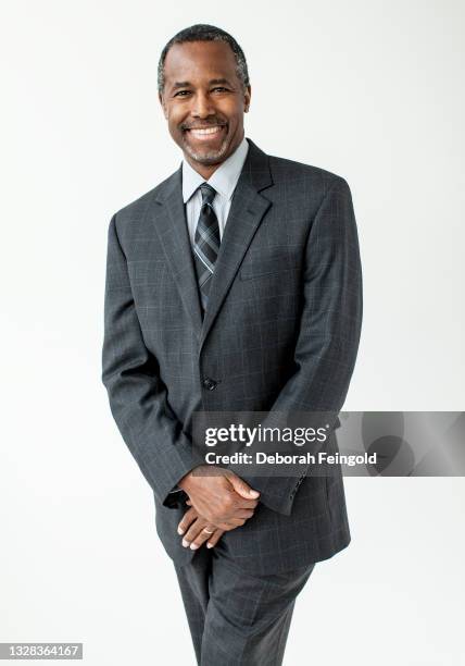 Deborah Feingold/Corbis via Getty Images) Portrait of American surgeon Ben Carson as he poses against a white background, New York, New York, 2013....