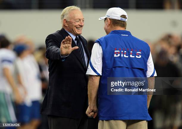 Owner Jerry Jones of the Dallas Cowboys talks with head coach, Chan Gailey of the Buffalo Bills at Cowboys Stadium on November 13, 2011 in Arlington,...