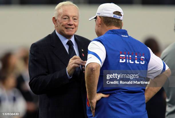 Owner Jerry Jones of the Dallas Cowboys talks with head coach, Chan Gailey of the Buffalo Bills at Cowboys Stadium on November 13, 2011 in Arlington,...