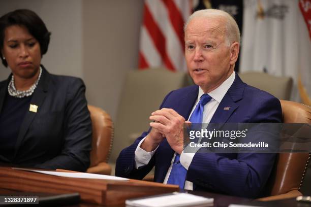 President Joe Biden hosts a meeting with Washington, DC, Mayor Muriel Bowser about reducing gun violence in the Roosevelt Room at the White House on...