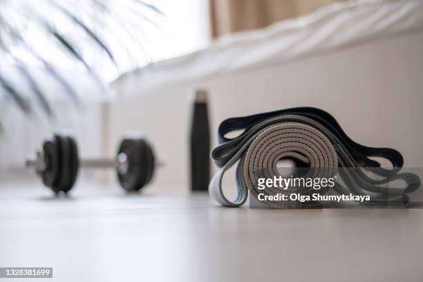 sports equipment for fitness at home in the bedroom on the floor - salle yoga photos et images de collection