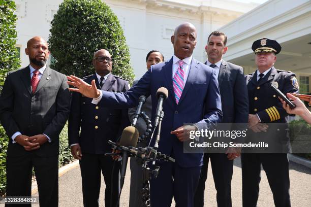 Brooklyn Borough President and New York City mayoral nominee Eric Adams talks to reporters with Community-Based Public Safety Collective Co-Founder...