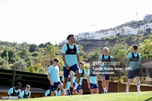 Lloyd Kelly with team-mates Jake Scrimshaw and Ben Greenwood of Bournemouth during a pre-season training session at the La Quinta Football Fields,...